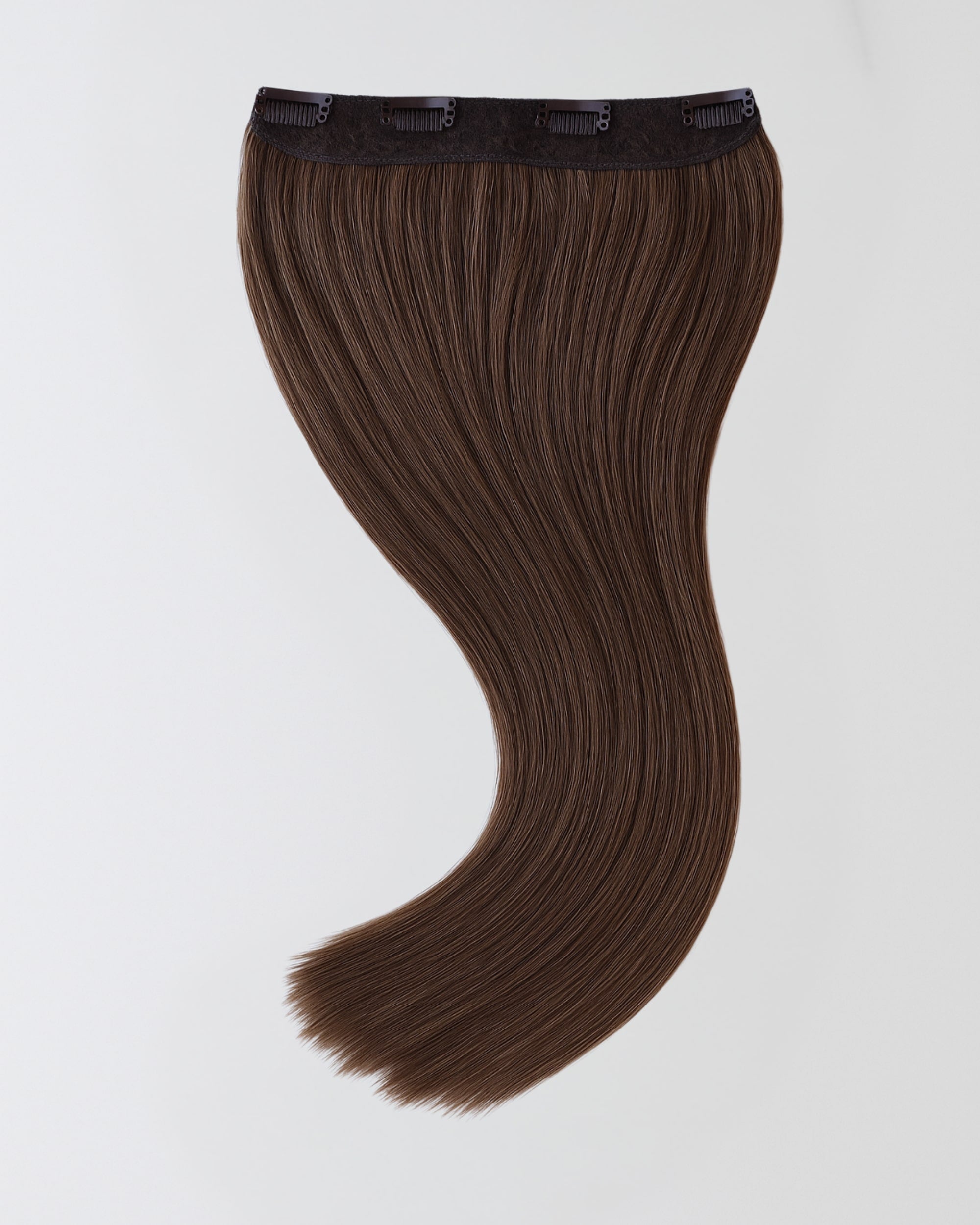Premium real hair clip-in extensions in natural brown hair