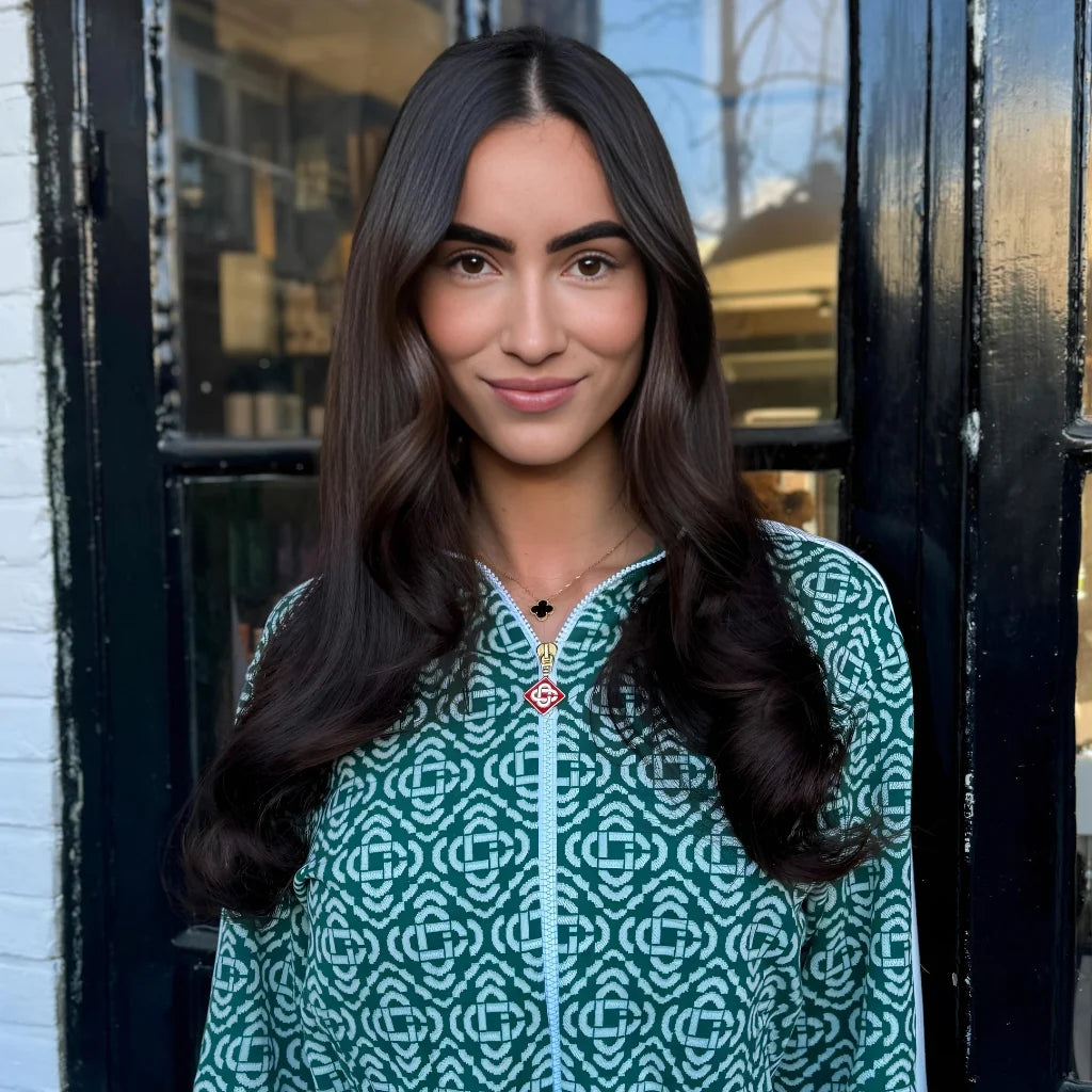 Haircut with long layers and elegant styling at BRUSH Amsterdam hair salon.