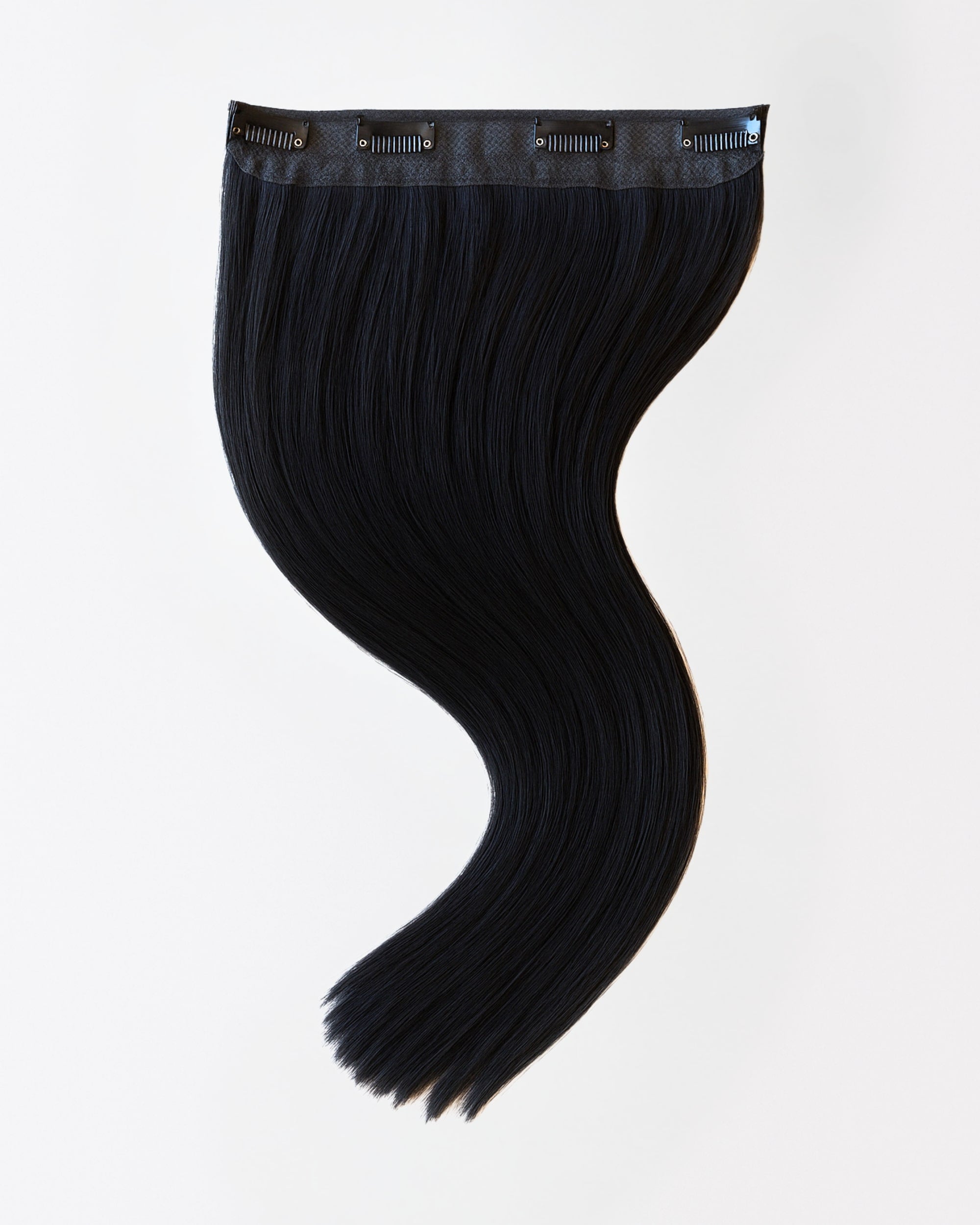 Premium real hair clip-in extensions in black hair 