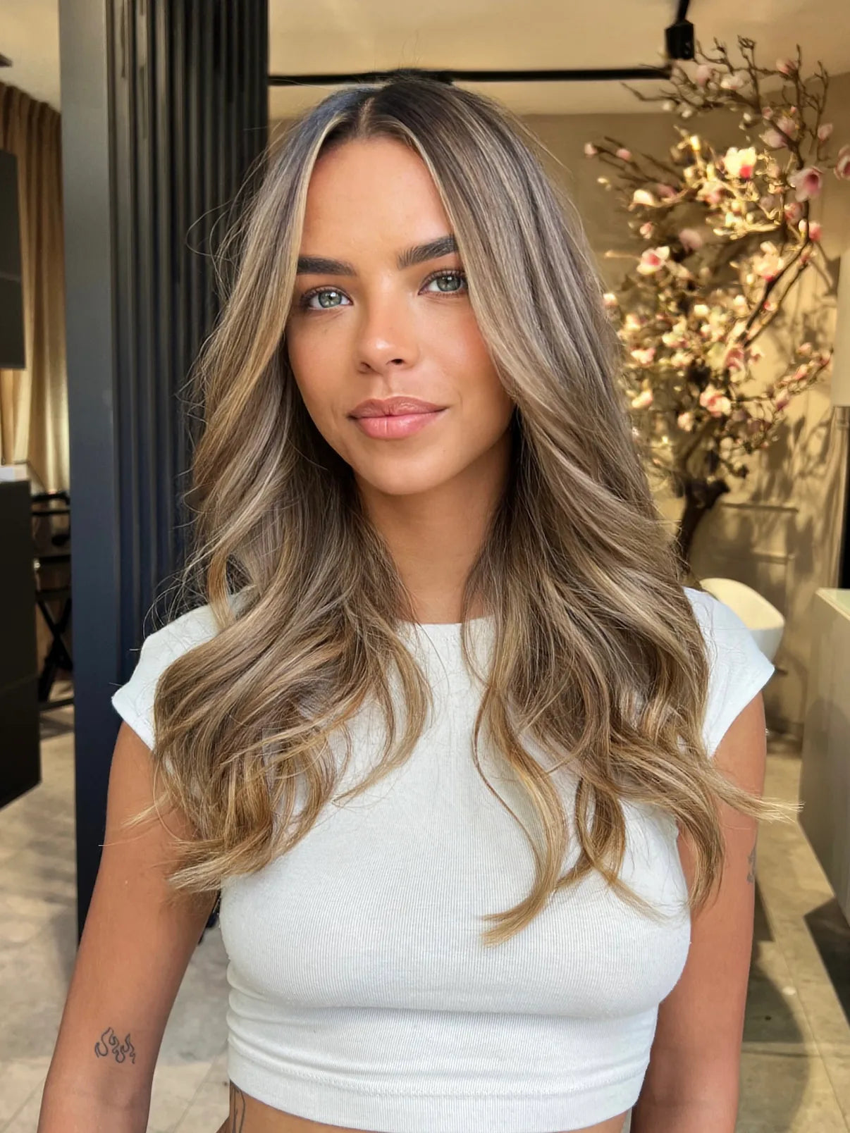 Light brown tape-in hair extensions at BRUSH Amsterdam