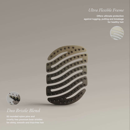 ZIGZAG Travel Hair Brush rotating to reveal ultra-flexible frame and duo bristle blend for no pulling or breakage.